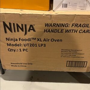 Ninja Foodi XL Air Oven in Cardboard Box. Brand new never been opened!